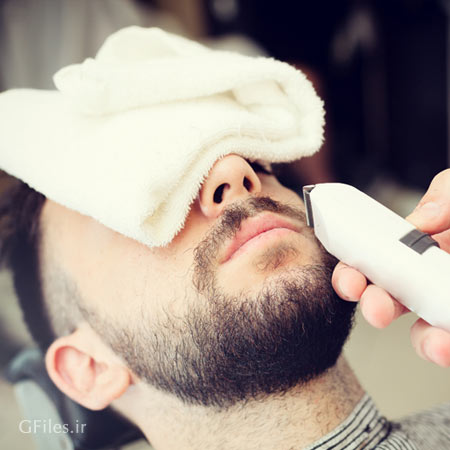 دانلود رایگان تصویر استوک و با کیفیت از مردی در حال اصلاح (پیرایش) صورت