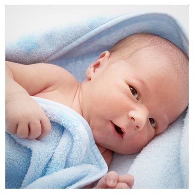 دانلود رایگان تصویر نوزاد پیچیده شده در حوله ، با فرمت jpg و کیفیت بالا